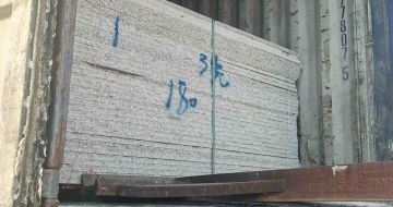 来宾 芝麻白花岗岩石材3.0公分光面毛板装柜出货