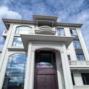 来宾白麻别墅外墙干挂石材效果示例