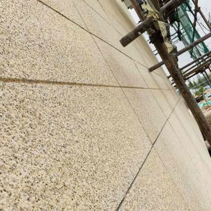 来宾 黄金麻花岗岩荔枝面外墙干挂石材效果示例