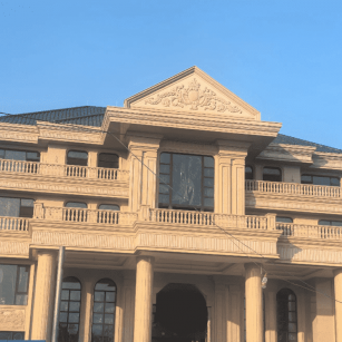 来宾黄金麻别墅外墙干挂石材效果示例