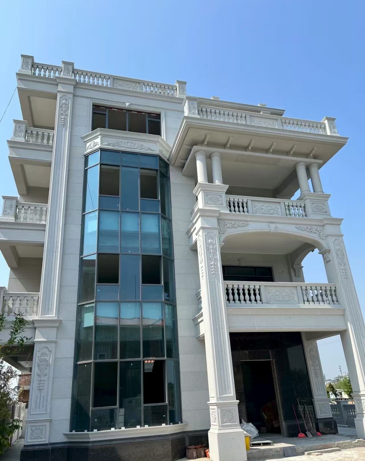 来宾 白麻花岗岩别墅外墙干挂效果展示