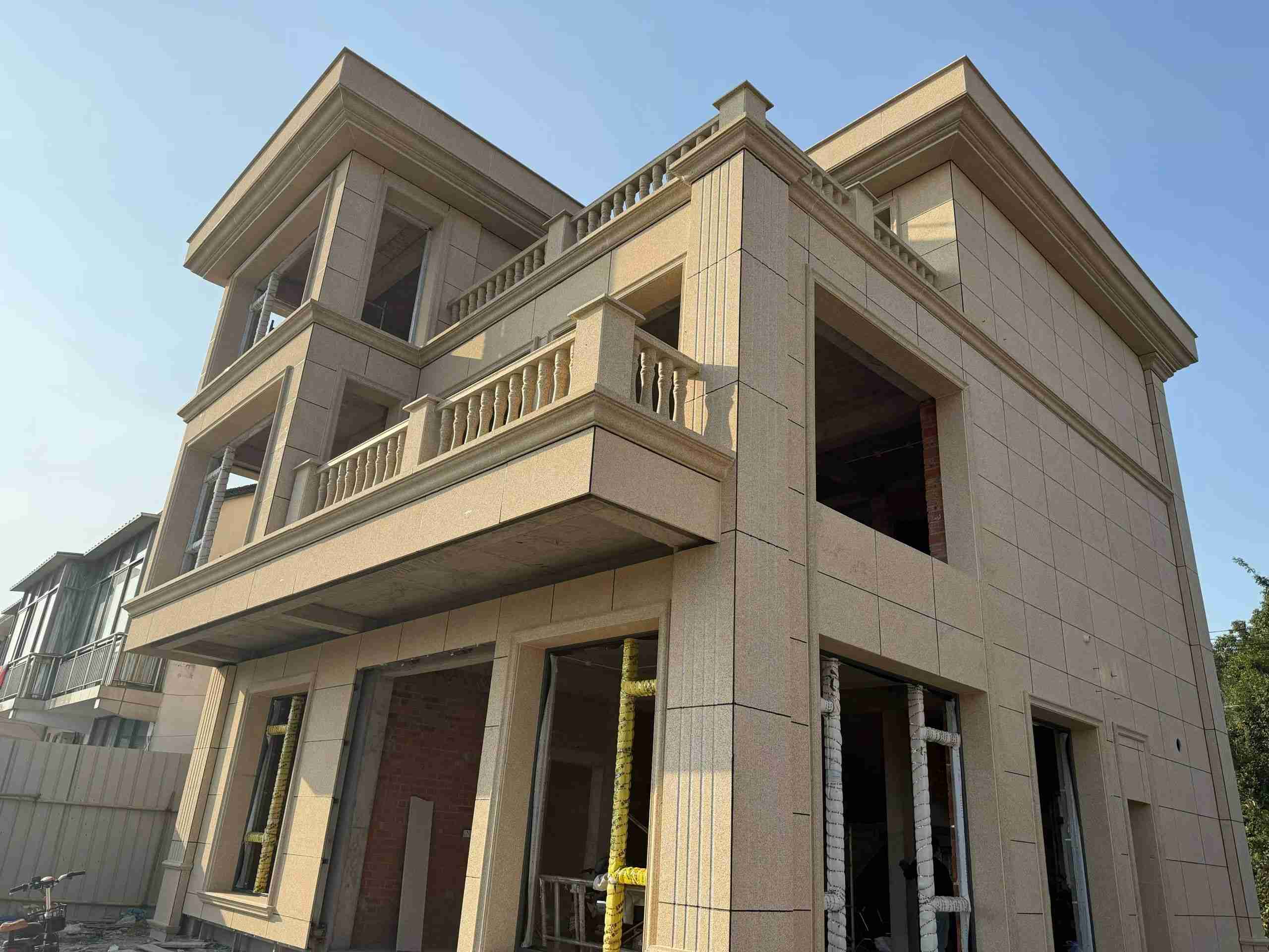 来宾 黄金麻花岗岩石材荔枝面外墙干挂效果展示