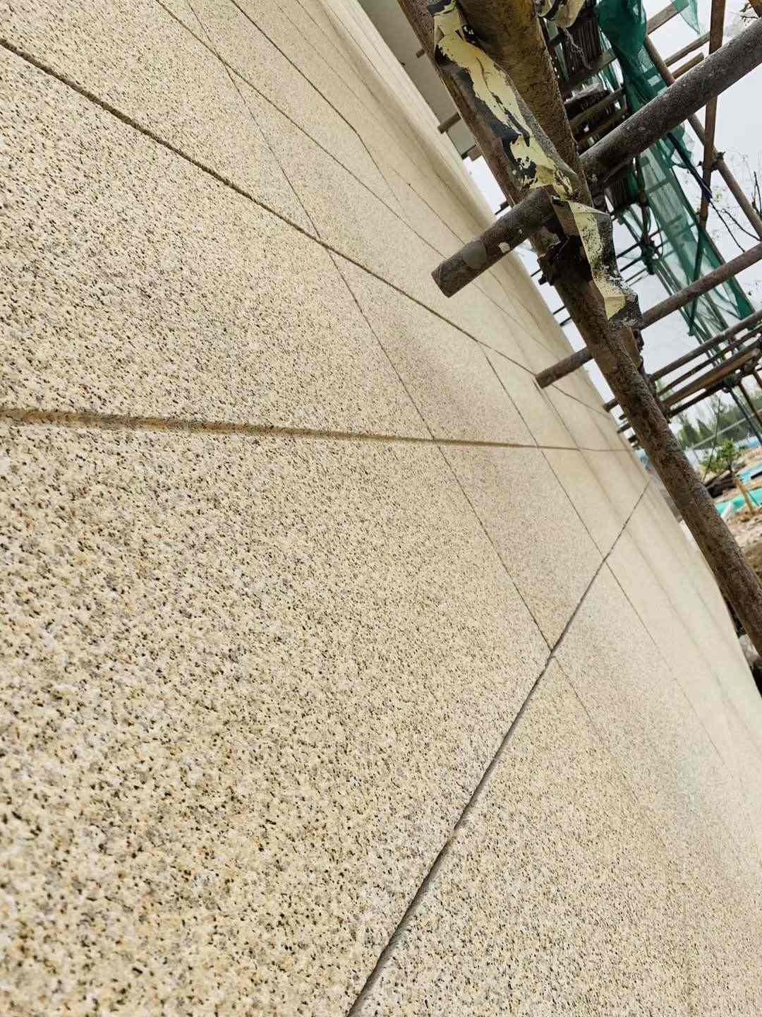 来宾 黄金麻花岗岩荔枝面外墙干挂石材效果示例